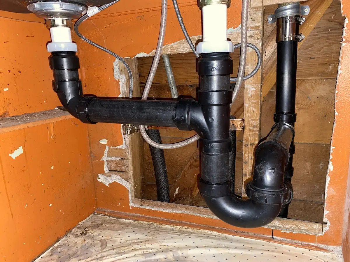 Professional Garbage Disposal Repair equipment and tools on the job in Pierre